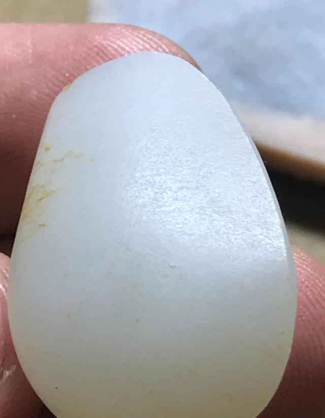 怎么样辨别和田玉籽料毛孔的真假